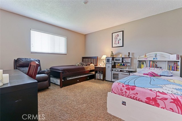 Guest Bedroom with walk in closet and private bathroom