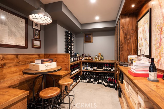 1500 bottle wine cellar with entertaining banquet that seats 6