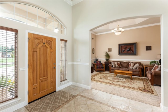 Nice entry way and formal living room.