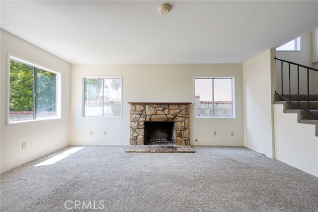 Wood Burning Fireplace at Entry