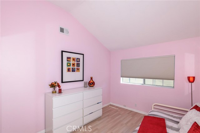 Guest bedroom 2 with high ceiling.