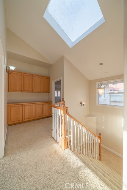 Storage cabinets off Master for linen/display with skylight over head