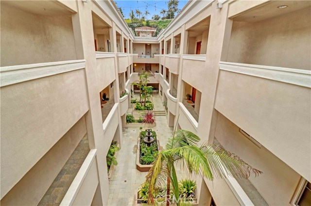 From elevator enter the tropical feel Courtyard in between the building.  Enjoy the sound of the water fountain 
Flowing.