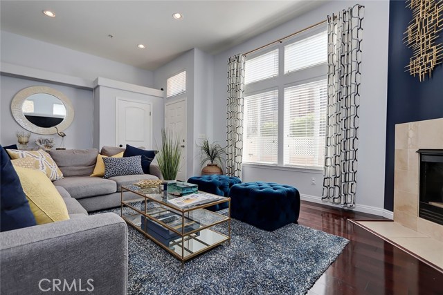 Front entry includes spacious coat closet, extra tall ceilings, and easy access to front yard patio.