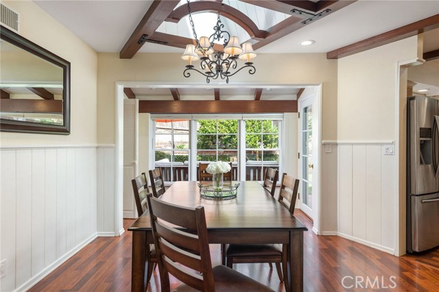 The dining area is at the heart of the home and looks out into the natural backdrop of the outdoors.