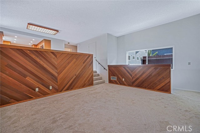 Living Room, showing entrance from Garage on Right side.