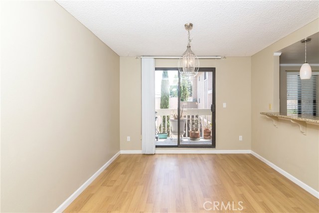 Separate Dining area with sliding glass doors to balcony