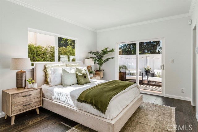 Airy, sun drenched, en suite main bedroom with walk-in closet and private patio.