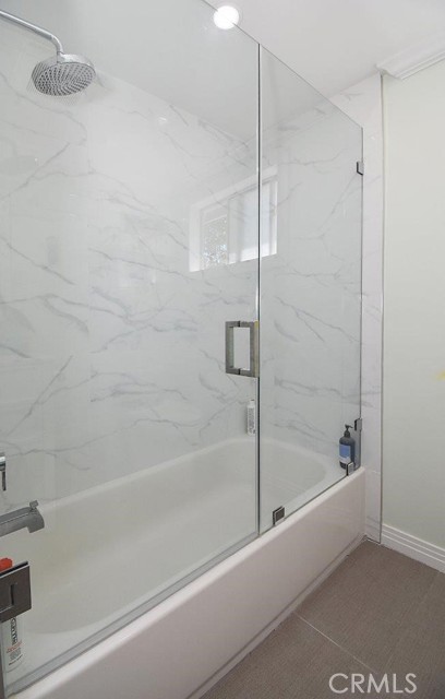 hall bath bathtub with rain  shower