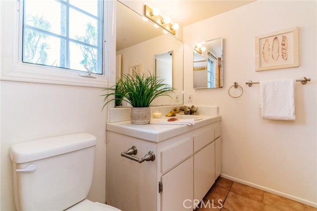 Bathroom #2 with shower and tub enclosure.