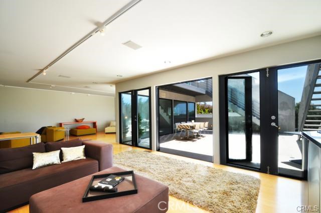 This is the other angle of the second floor clearly seeing all the glass doors and indoor outdoor living at its best!