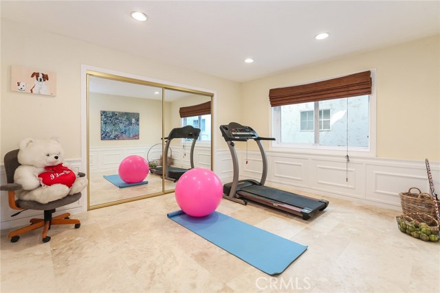 Guest Bedroom with travertine flooring which is throughout the guest bedroom level