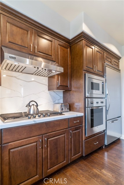 Custom kitchen cabinetry. Cuisinart cookware included.