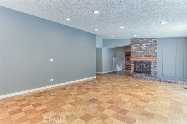 View from living room through foyer around into dining room