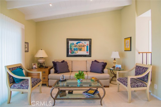 Living room sitting area near entry to the home