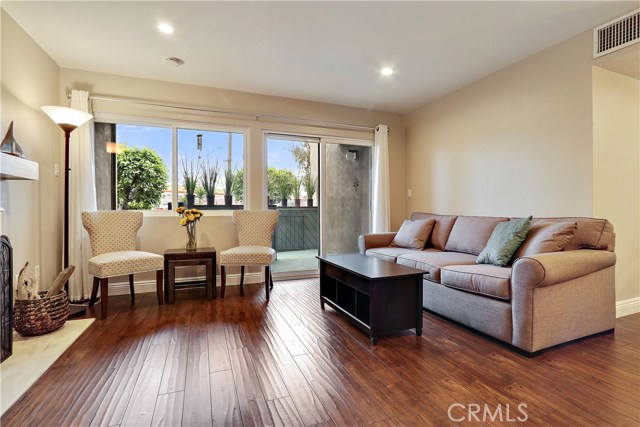 Living room with view of deck off double paned sliding glass door