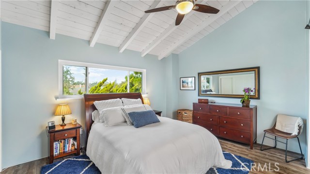 Master Bedroom with Vaulted ceilings and ceiling fan