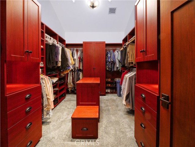 Large walk-in master bedroom wardrobe.