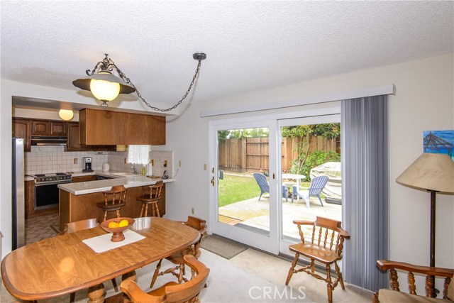 The dining room has sliders out to the rear patio and yard!