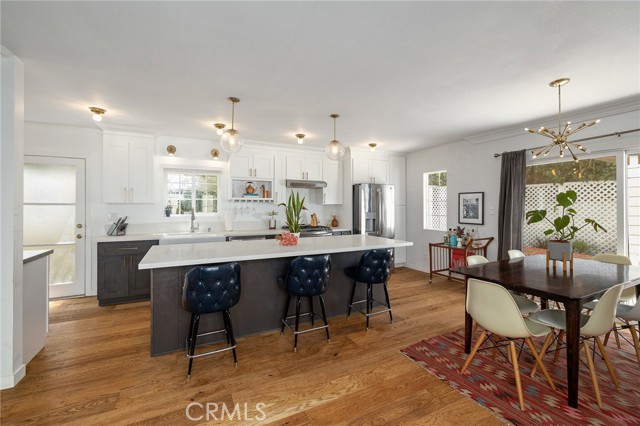 Kitchen opens up to living & dining room