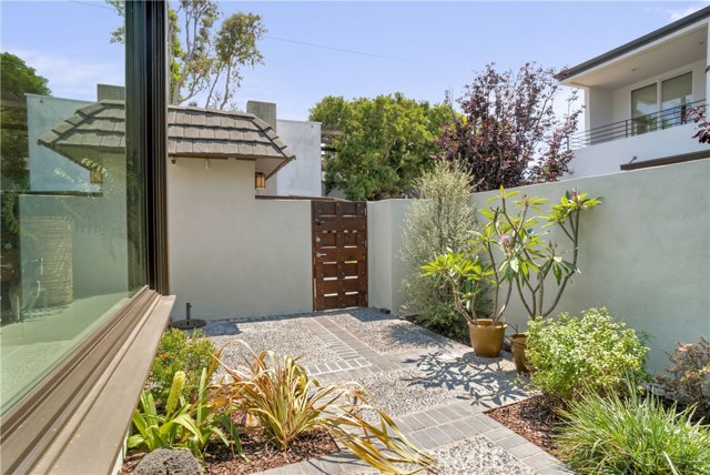 From front door looking towards entry gate.