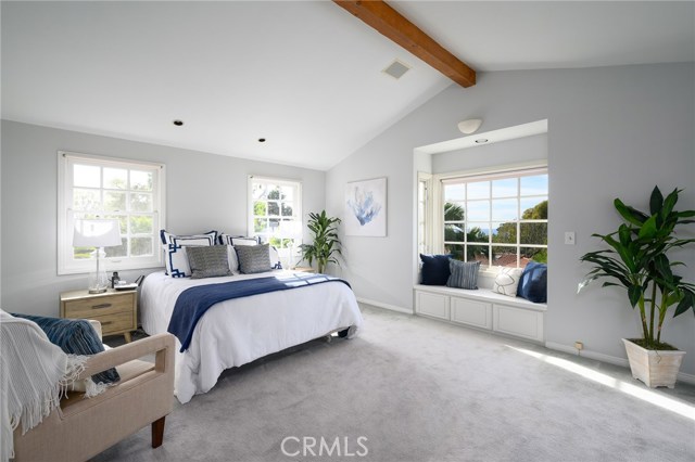 Masterbedroom with ocean views and vaulted ceilings