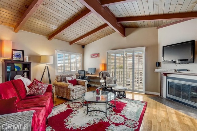 Open Beam Cathedral ceilings with wood floors in your living room