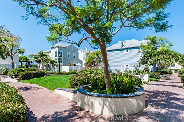 Beautifully landscaped walkway through the community