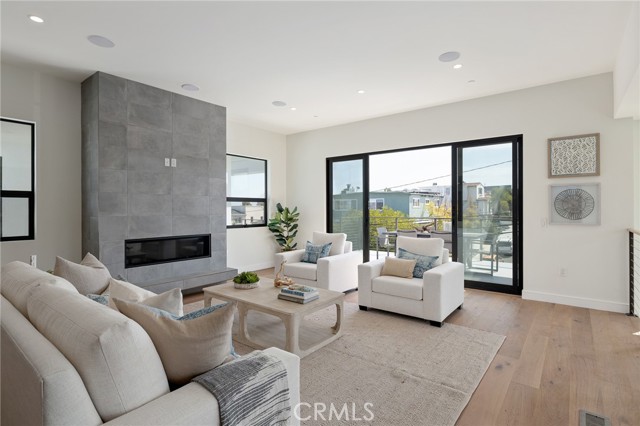 Open and versatile floor plan leads to spacious sun drenched balcony (shown here using reverse of 961 Unit A staging)