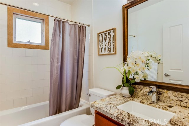 Full bathroom at end of hall