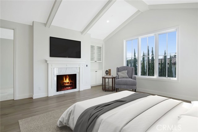 Beautiful master bedroom with vaulted ceilings and bright light.