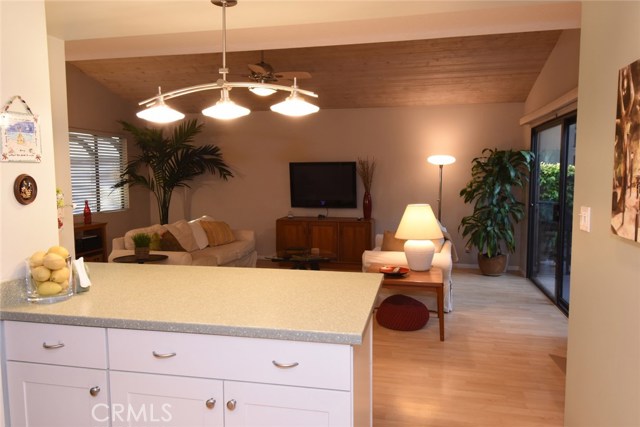 The kitchen opens right onto the family room...slider to the right opens onto the rear yard.  Perfect for entertaining. :)