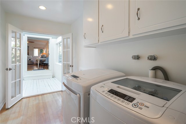 Laundry area in main home with access to the middle deck and back unit.