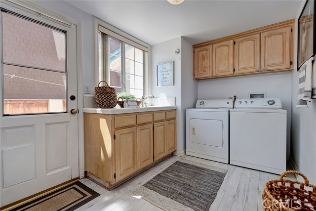 Laundry Room with Access to Side Yard Area