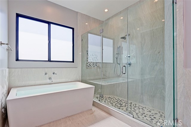 MASTER BATH WITH SEPARATE SHOWER WITH COMFORT SEAT AND TUB