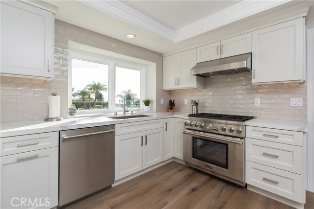 Another kitchen shot. You'll love the gourmet Thermador 6 burner range!