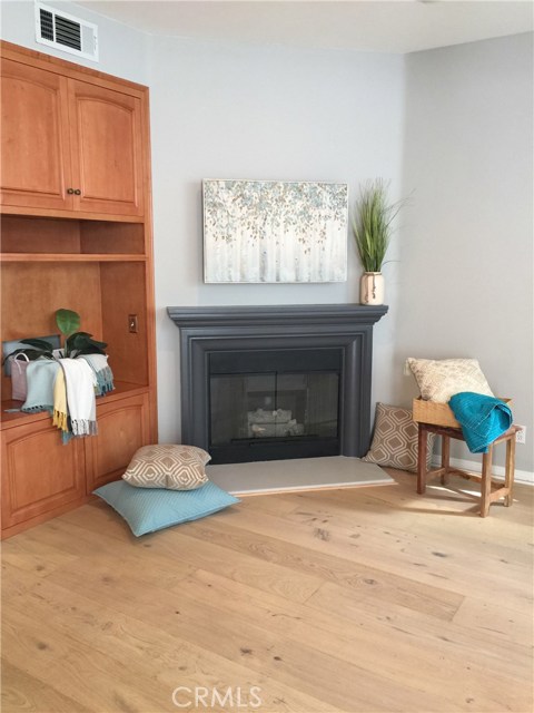 Bright living room with fireplace.