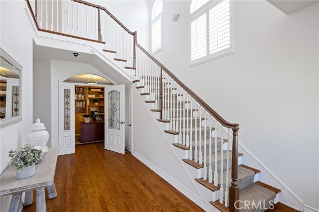 Front entryway leading to staircase and dedicated office. Front entryway leading to staircase and dedicated office.