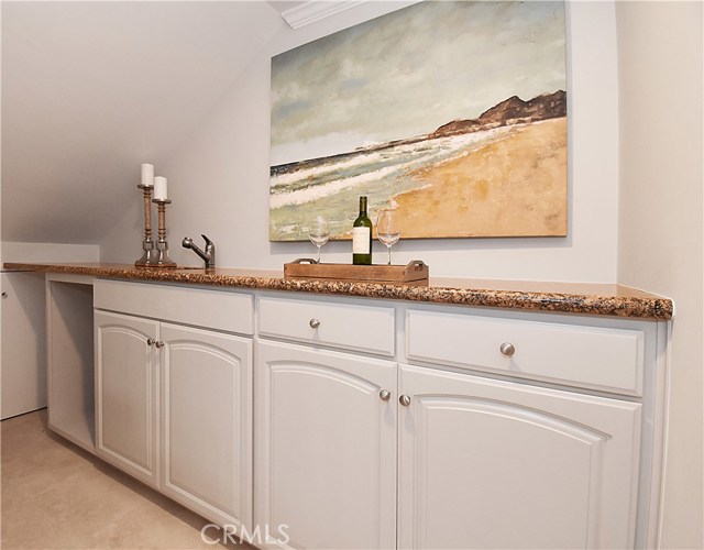 Wet Bar next to downstairs family room for entertaining