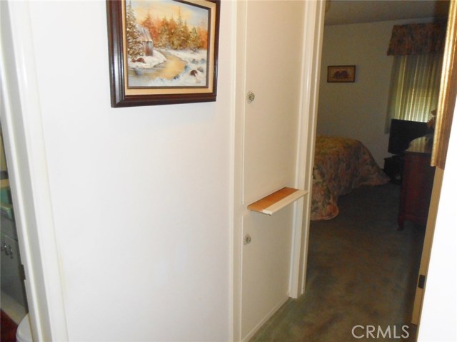 Hallway Linen Closet with Custom Retractable Folding Board...Yes, that is whats it's meant for.