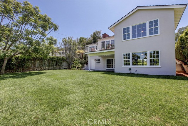 Private Backyard with a Lush Play Friendly Lawn