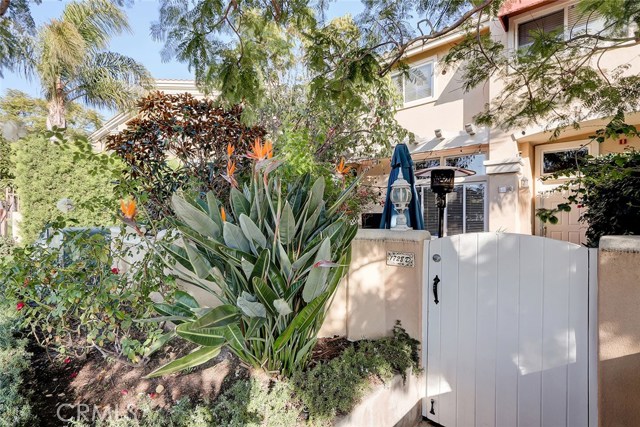 Lush landscaping and private exterior entrance completes this picture perfect retreat.