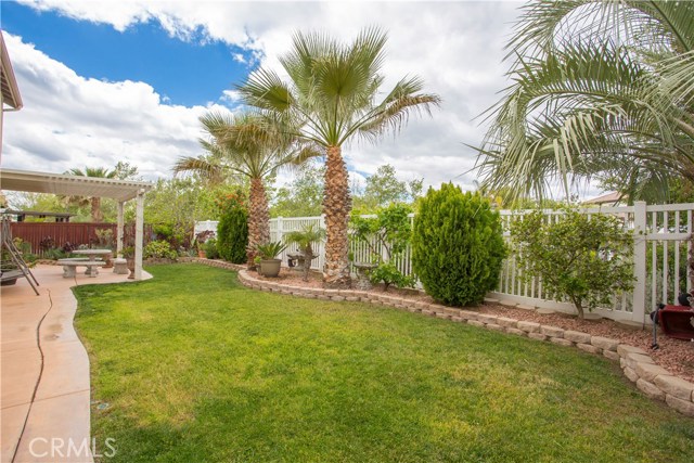 Garden Overlooks Mature Greenery and Walking Trail