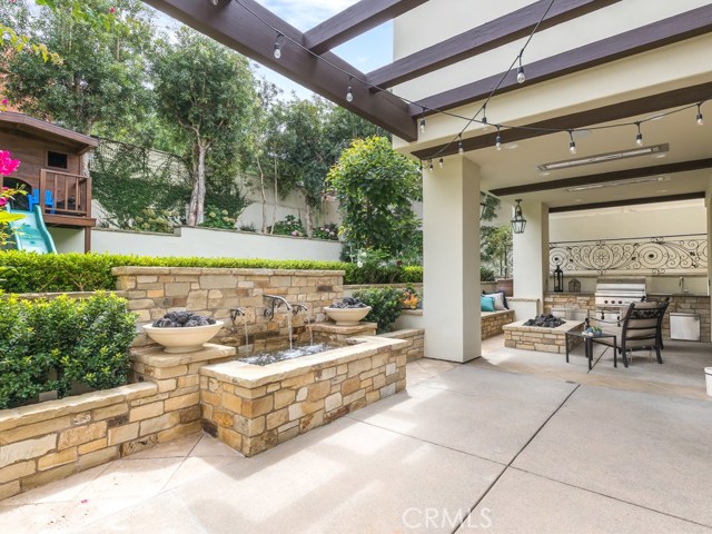 Generous patio area and expansive upper play area.