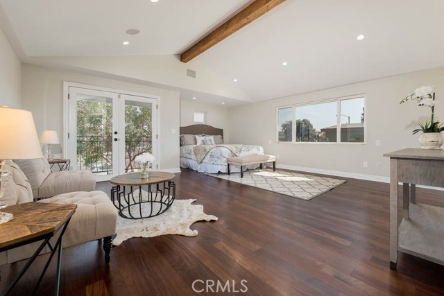 Huge master suite with recessed lights, French doors to balcony, walk in closet and a super sexy master bath.