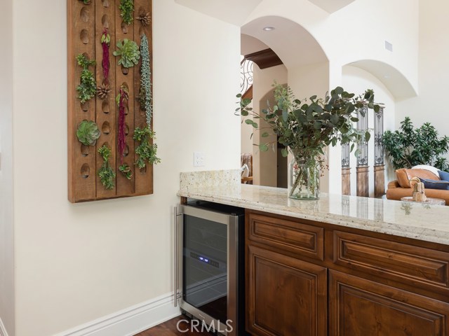 Bar area with built in wine fridge,