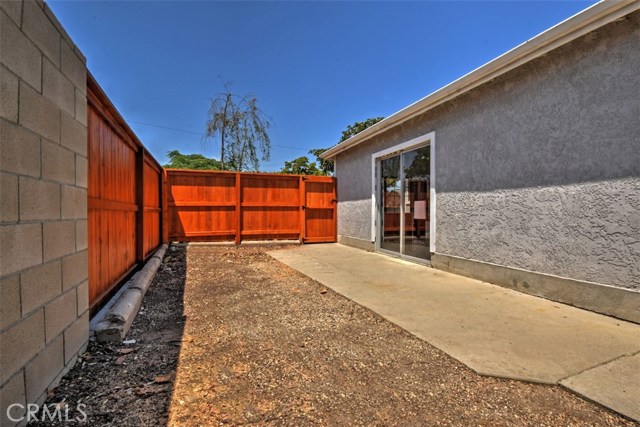 Patio area w/ new cedar fence off of Master.