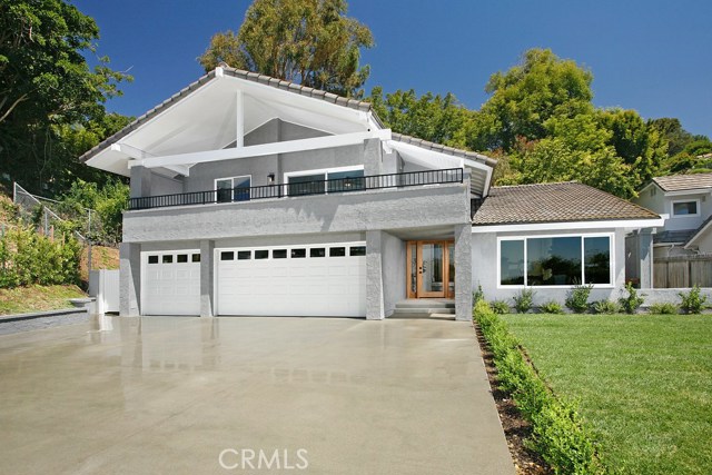 Exterior Front and Backyard: Gated-Swing gate-New sand finish driveway-New exterior lighting-Freshly painted exterior-New sod-New Myoporum-New Boxwood-New Ligustrum-New Little Ollies Olive-New Silver Sheen-New Purple Salvia-New sprinkler valves and timer-New DRIP emitters-New vinyl side gate-New wood deck 2 x 6 Interior Throughout: Freshly painted -New dual pane windows- New wood and glass entry door with complementary side lights-New recessed lights-New Gold Kelly Wearstler Cubist Medium Chandeliers-New M