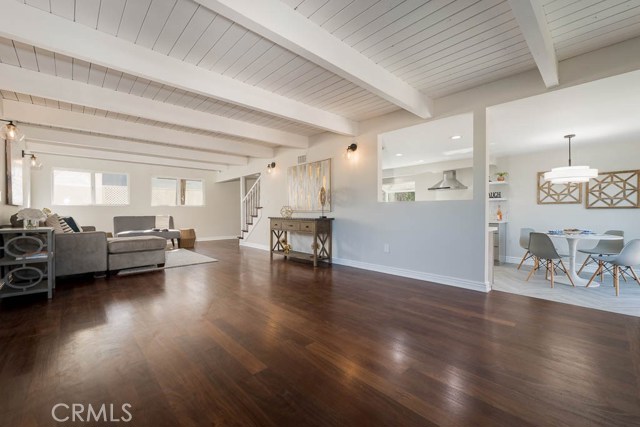 Gleaming hardwood floors, beam ceilings and lots of space