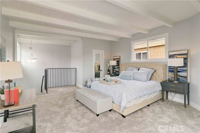 Upstairs master 14.5' x 16' with balcony and walk-in closet.